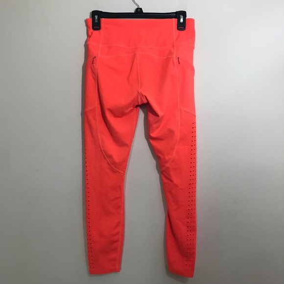 NWOT Athleta Neon Orange Laser Cut Leggings - Picture 6 of 6